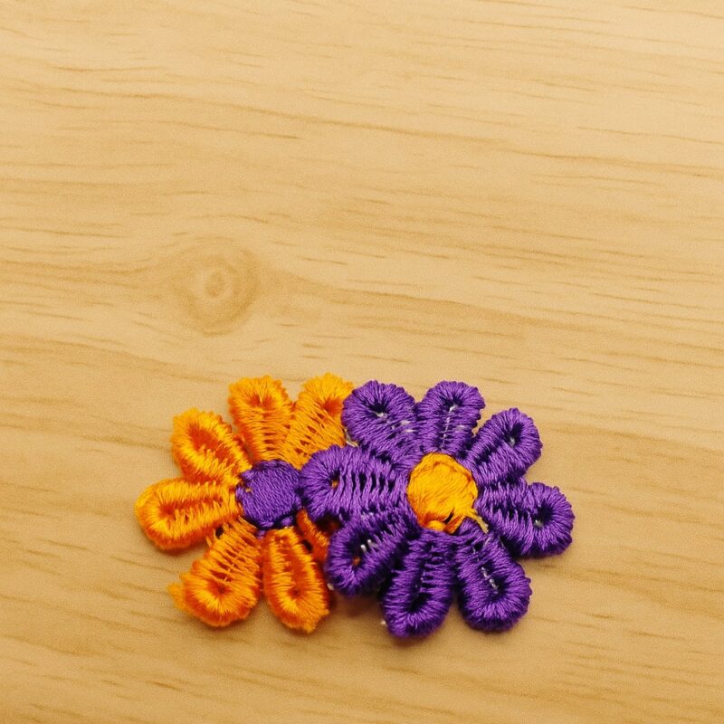 Bloem oranje en paars