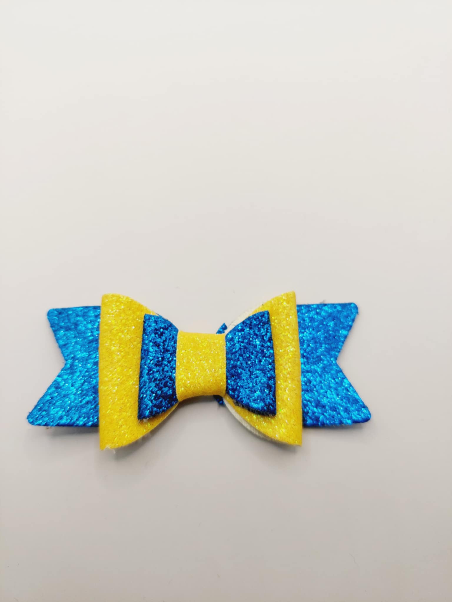 Strik blauw met geel glitter