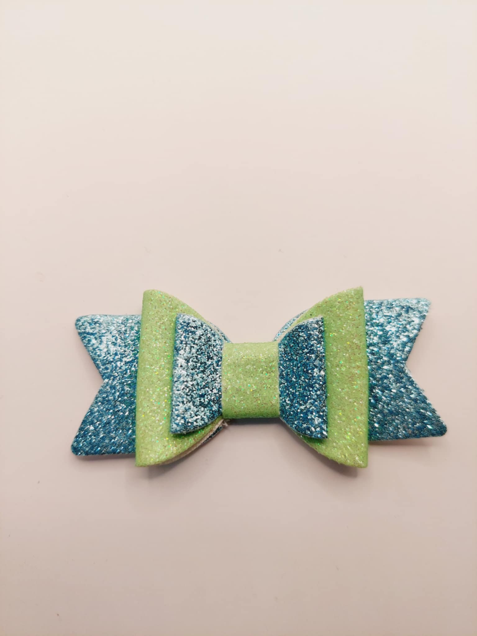 Strik blauw en licht groen glitter