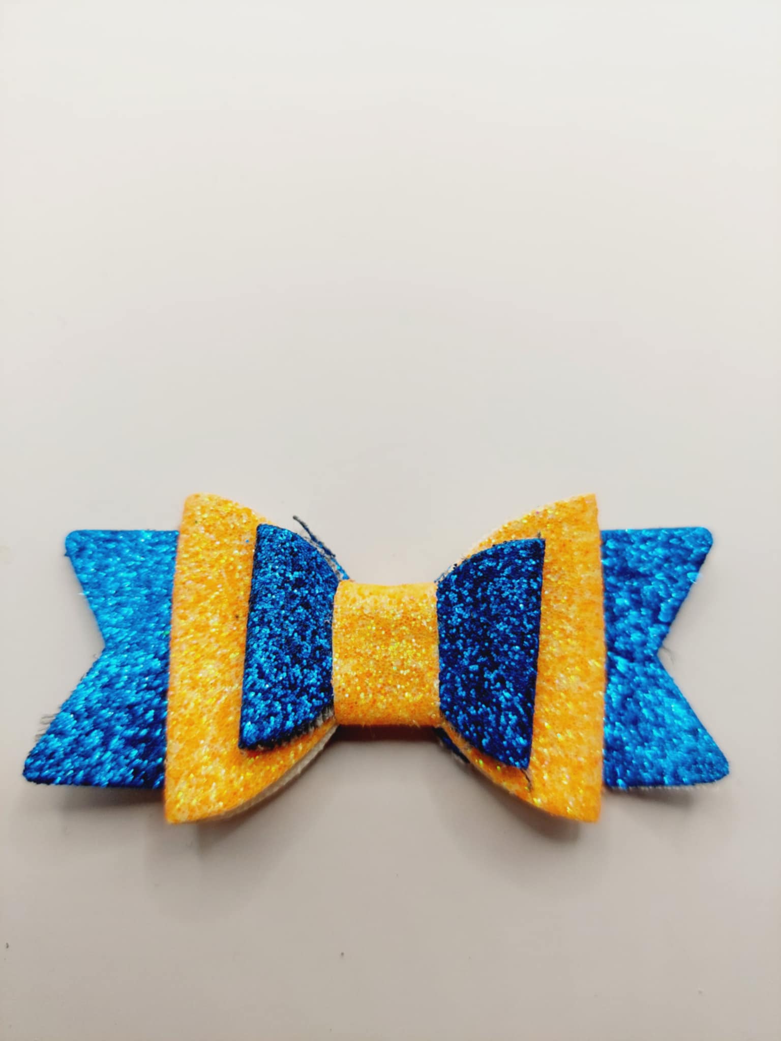 Strik blauw en oranje glitter