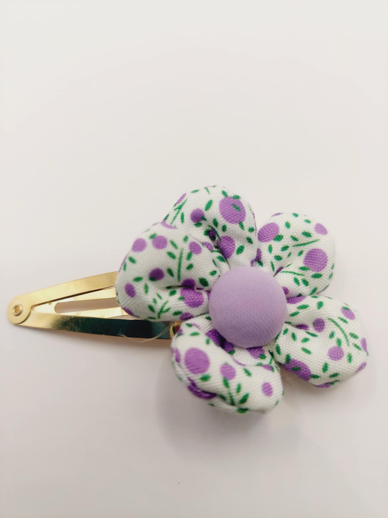 Haarclip met een rubber coating met een paars bloem