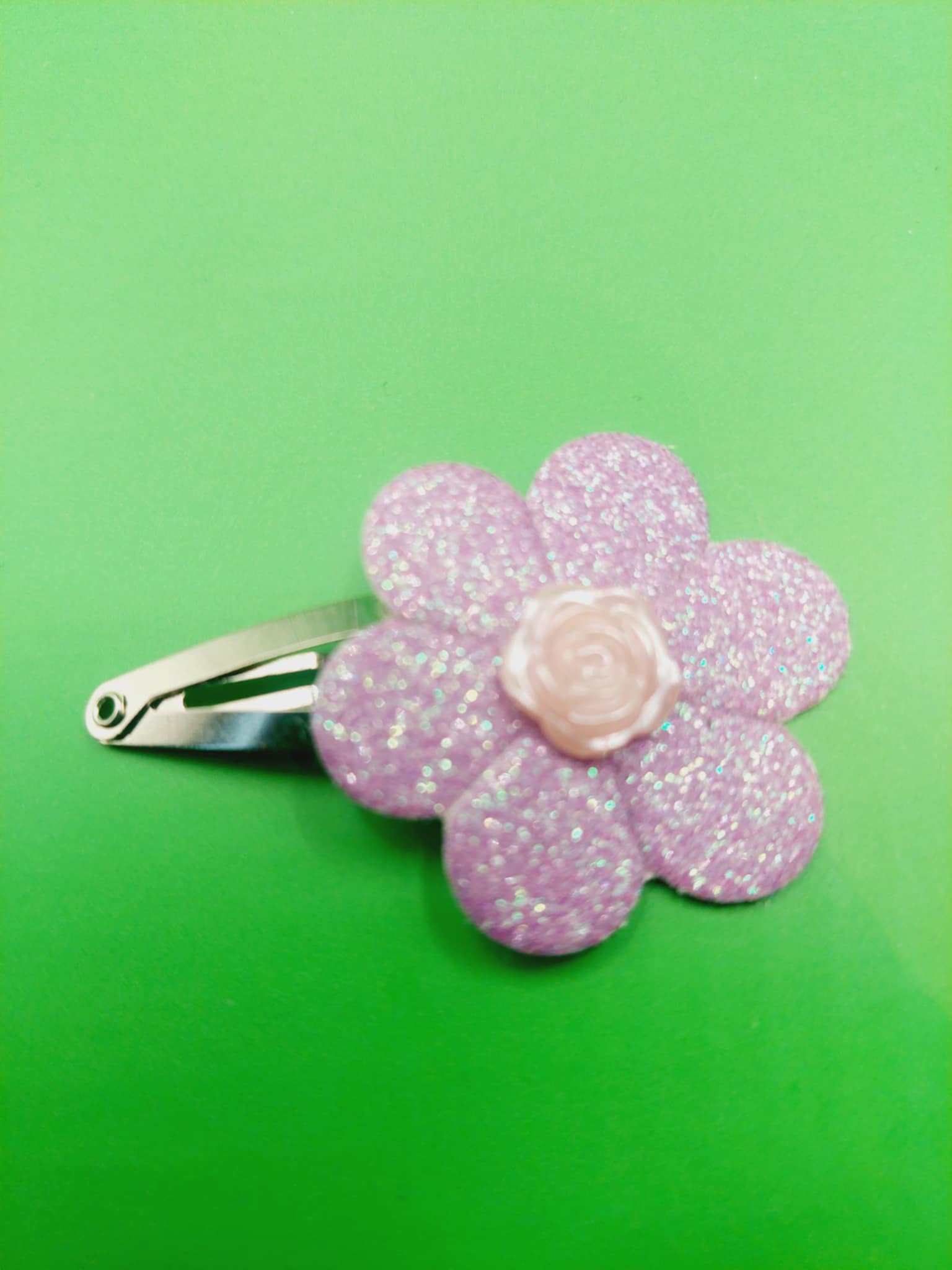 Haarspeld 4 cm licht paarse glitter bloem