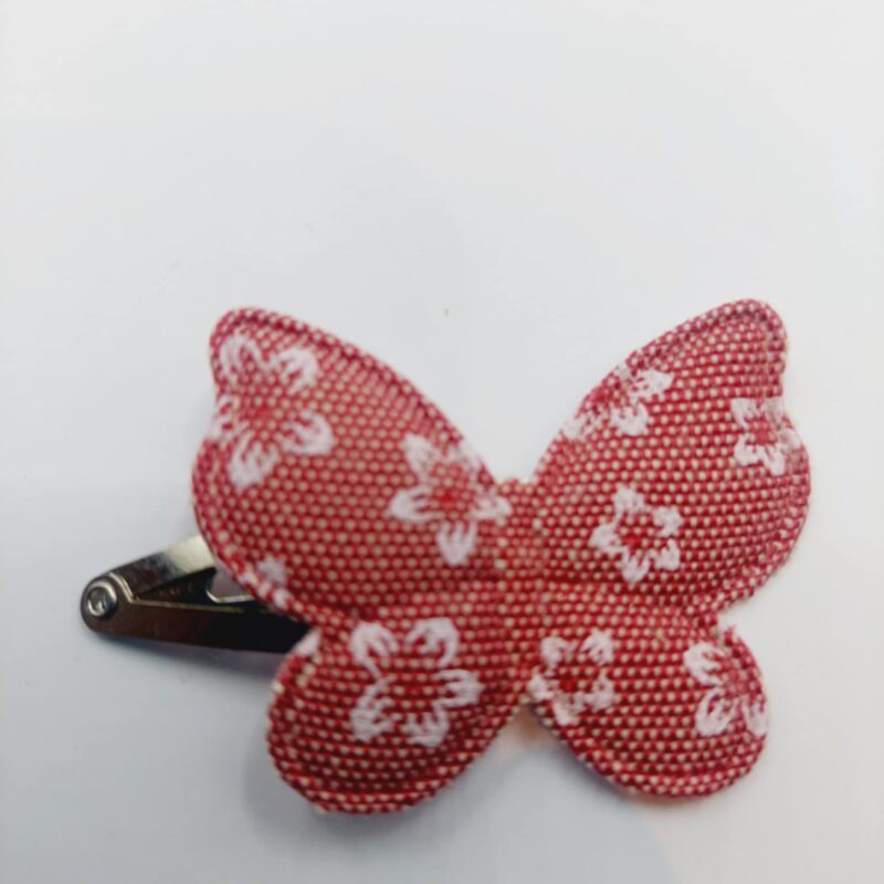 Haarclip van 4 cm met een rood vlinder met bloemmetjes opdruk