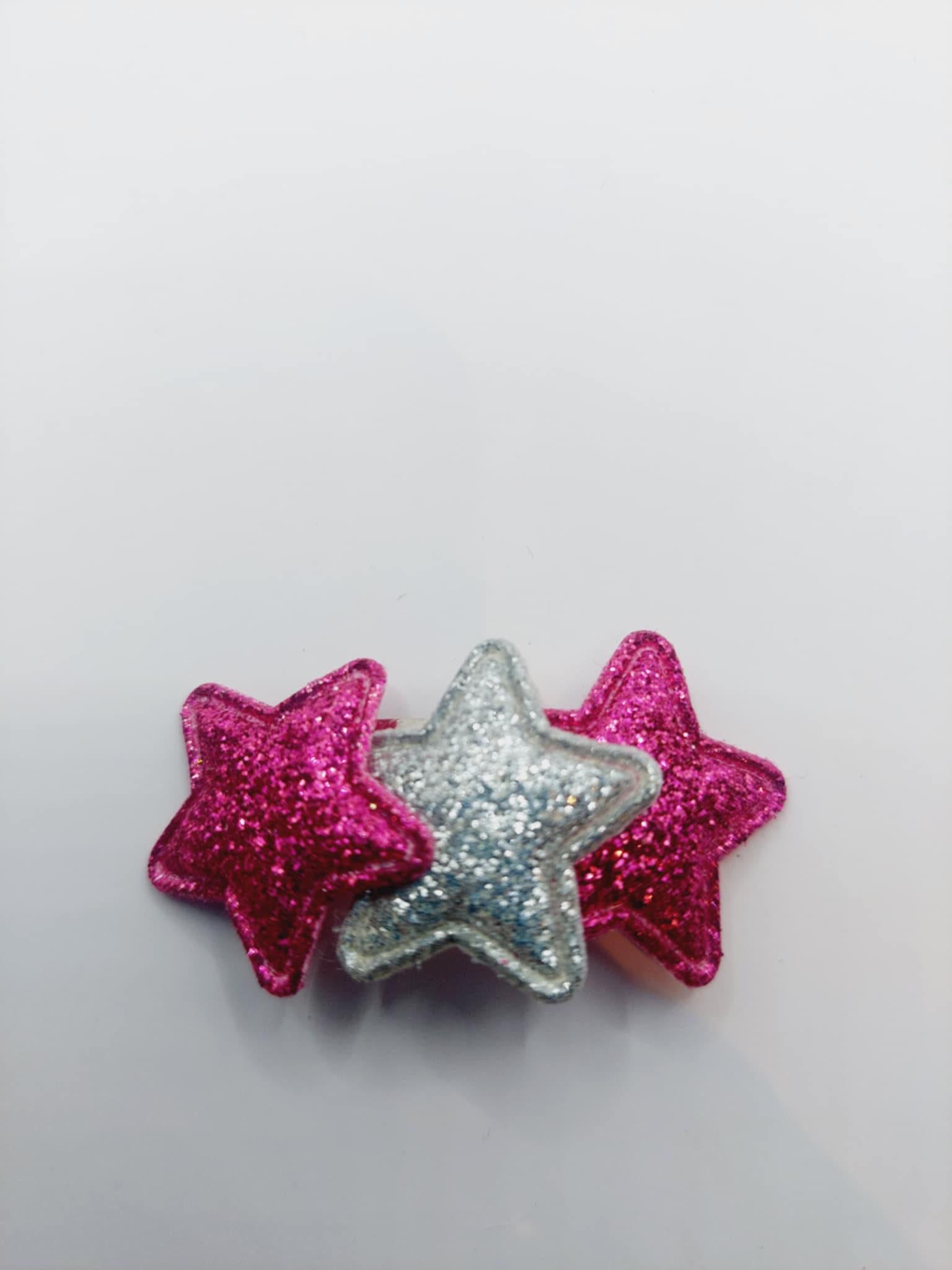 Haarclip 4 cm paars en zilver ster van stof