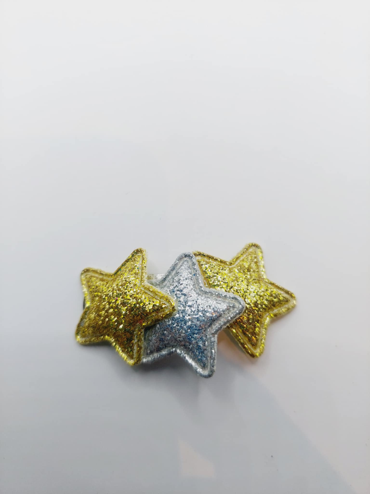 Haarclip 4 cm goud en zilver ster van stof