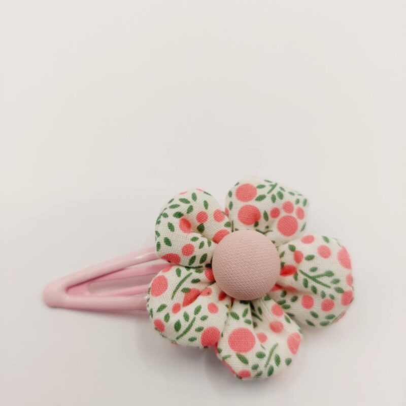 Haarclip met een rubber coating met een roze bloem met glitter